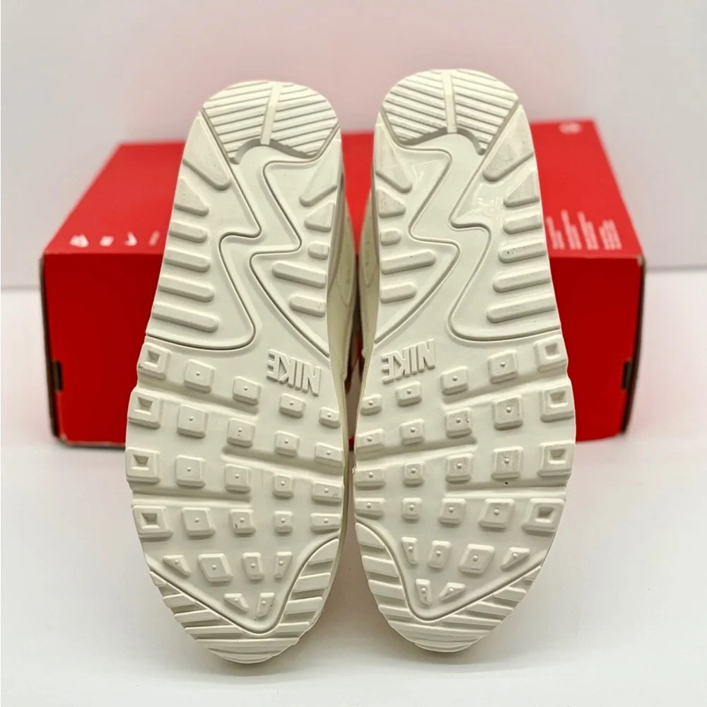 Nike Women's Sneaker in Cream with Pale Pink Swoosh